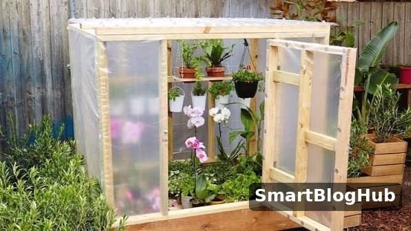 homemade wooden mini greenhouse with plastic cover and orchids - diy greenhouse ideas