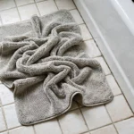 wrinkled bathroom floor mat with ripples to stop bathroom floor mat bunching up